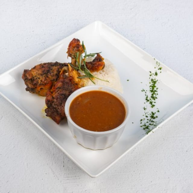Chicharrón Pollo con Hueso / Crispy Bone-In Fried Chicken.